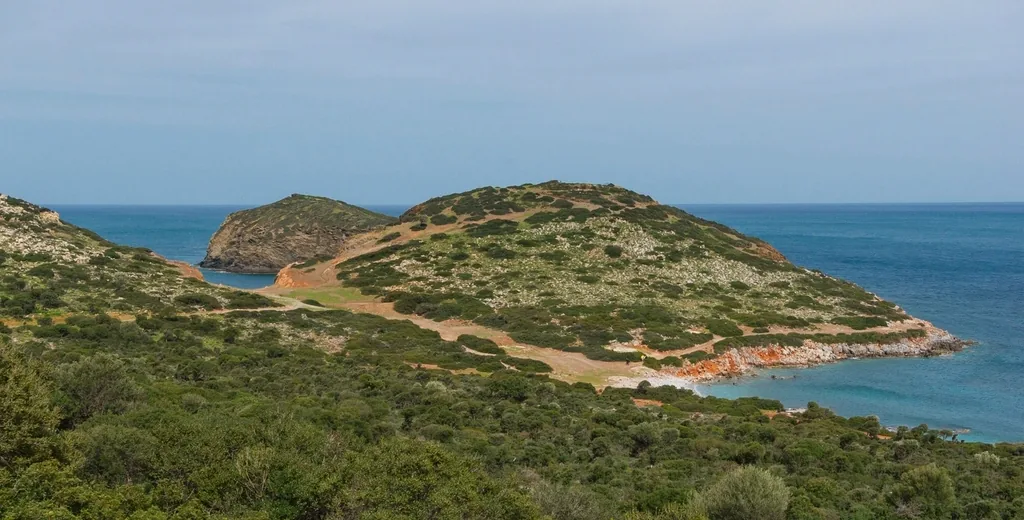 A coastline with a peninsula and bay in eastern Crete.